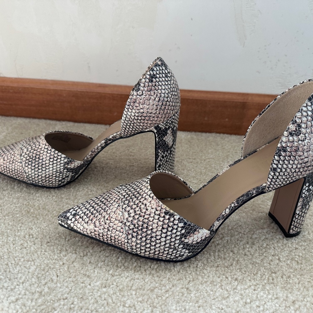 Snakeskin closed toe pumps